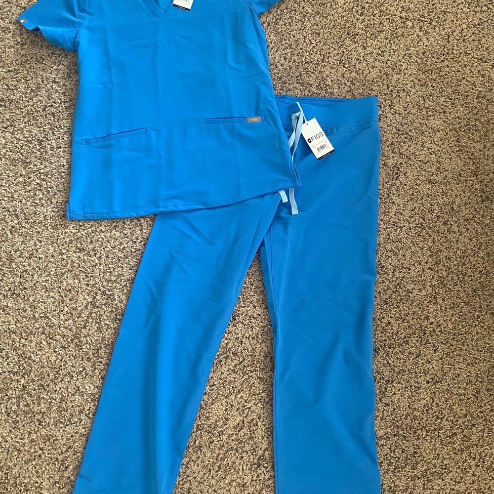 Figs brand blue scrubs. Size small. New with tags